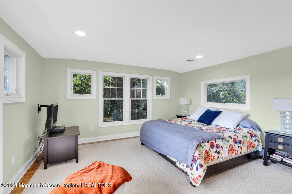 405 Brown Street Brielle, NJ 08730 - Photo 34 of 92 a bedroom with a bed and a window