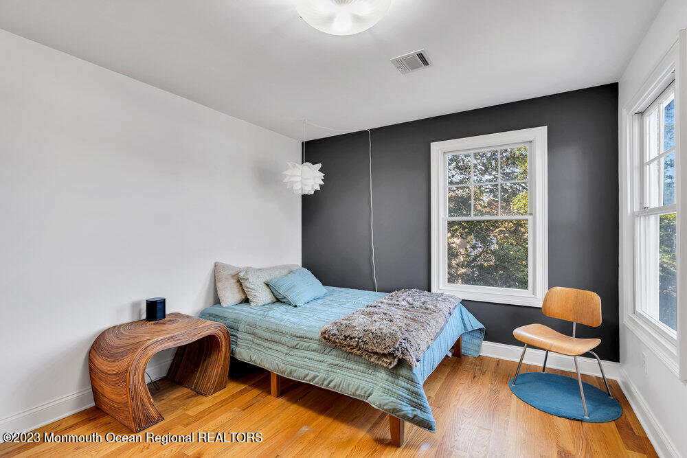 405 Brown Street Brielle, NJ 08730 - Photo 43 of 92 a bedroom with a bed and a window