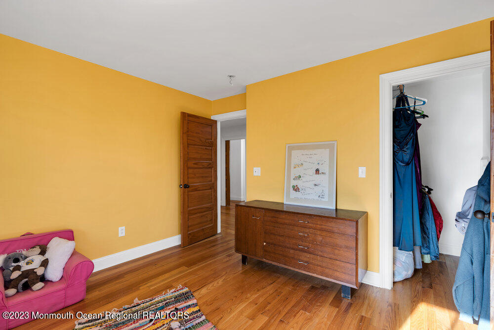 405 Brown Street Brielle, NJ 08730 - Photo 45 of 92 a view of a room with wooden floor and closet
