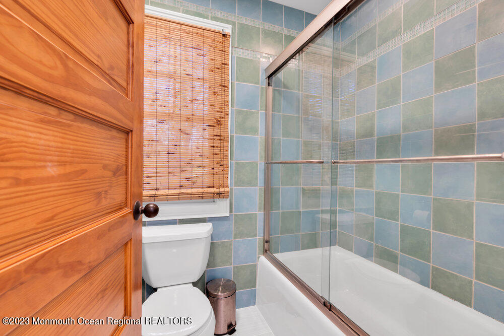 405 Brown Street Brielle, NJ 08730 - Photo 50 of 92 a bathroom with a toilet and a bathtub