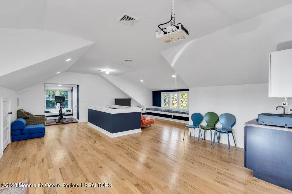 405 Brown Street Brielle, NJ 08730 - Photo 53 of 92 a living room with furniture and a wooden floor