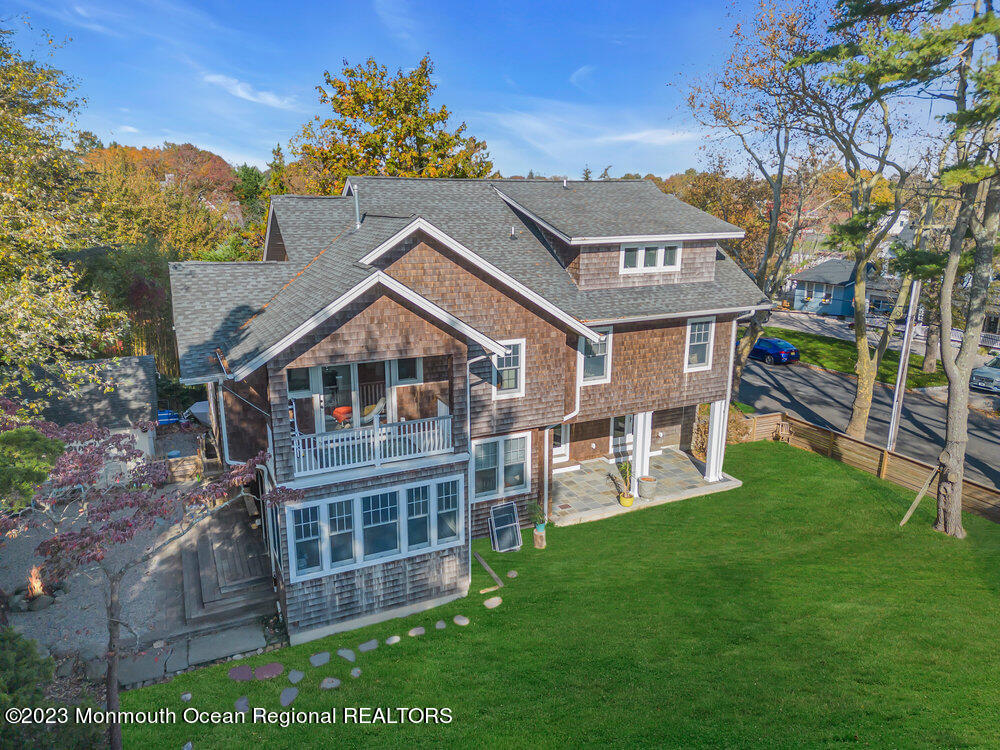 405 Brown Street Brielle, NJ 08730 - Photo 72 of 92 a aerial view of a house with a yard