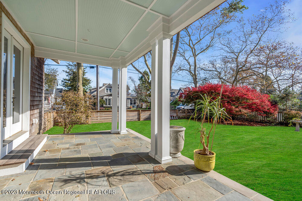 405 Brown Street Brielle, NJ 08730 - Photo 76 of 92 a front view of a house with garden