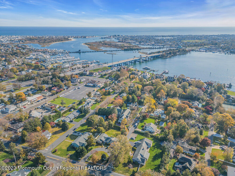 405 Brown Street Brielle, NJ 08730 - Photo 88 of 92 an aerial view of ocean and residential houses with outdoor space