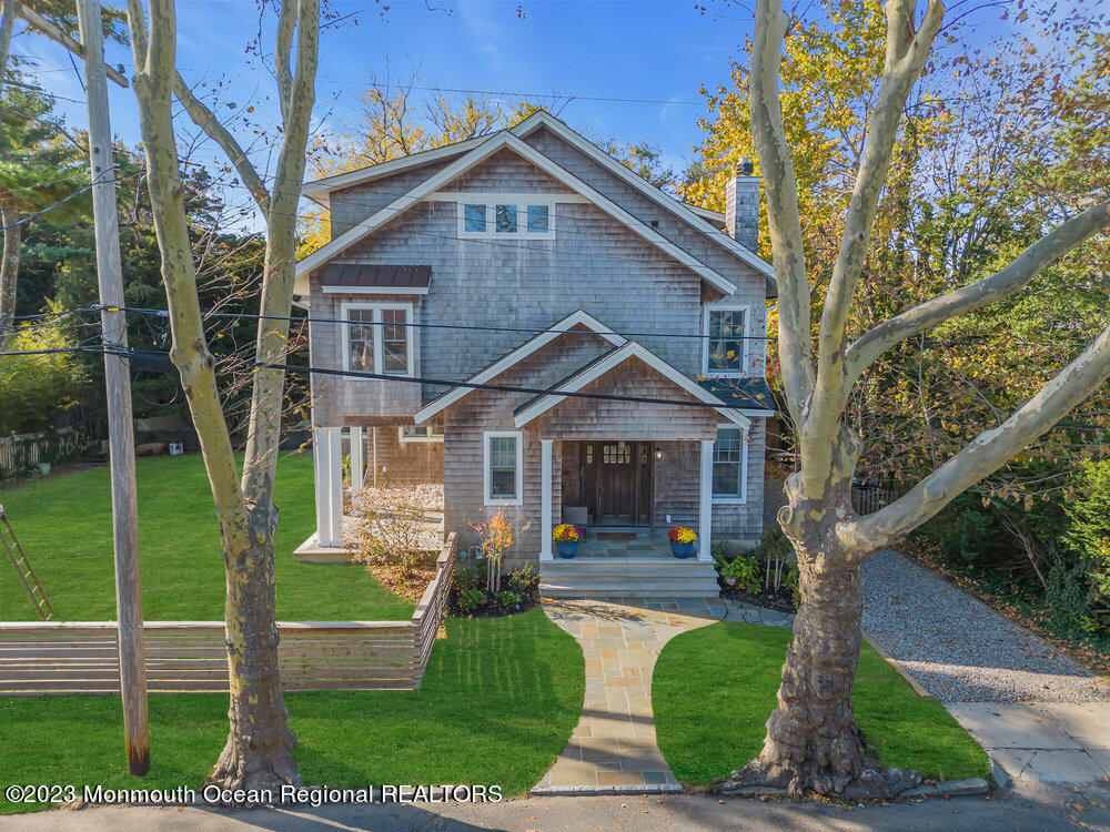 405 Brown Street Brielle, NJ 08730 - Photo 90 of 92 a front view of a house with garden