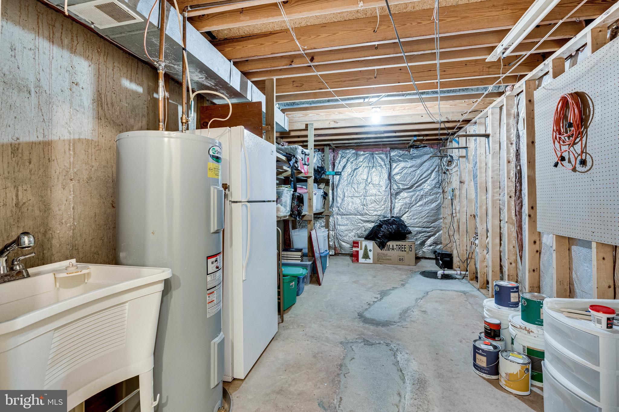 13620 Old Dairy Road Herndon, VA 20171 - Photo 46 of 60 Ample Storage with utility sink and extra fridge