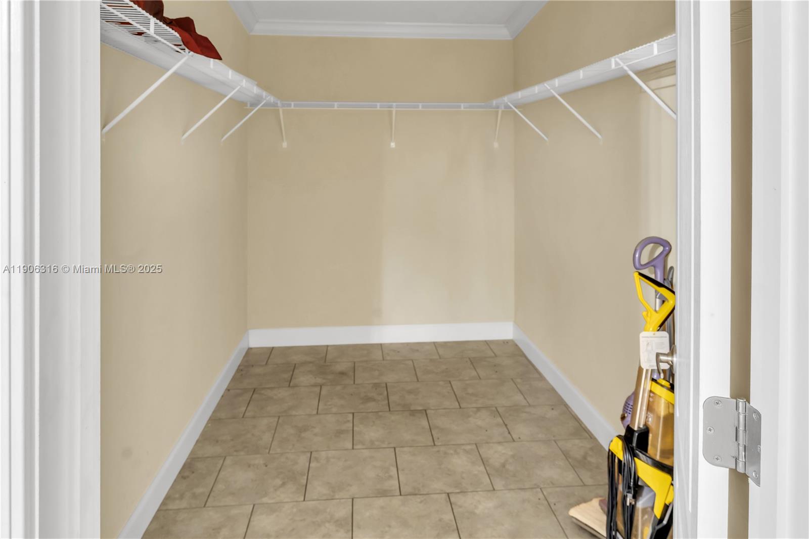 11341 Pruett Road Seffner, FL 33584 - Photo 11 of 50 a view of a room with rack on the wall