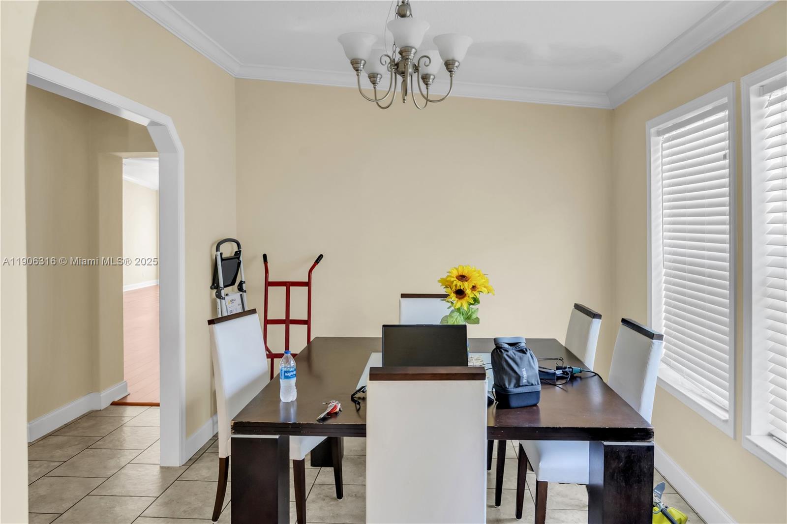 11341 Pruett Road Seffner, FL 33584 - Photo 13 of 50 a view of a dining room with furniture and chandelier