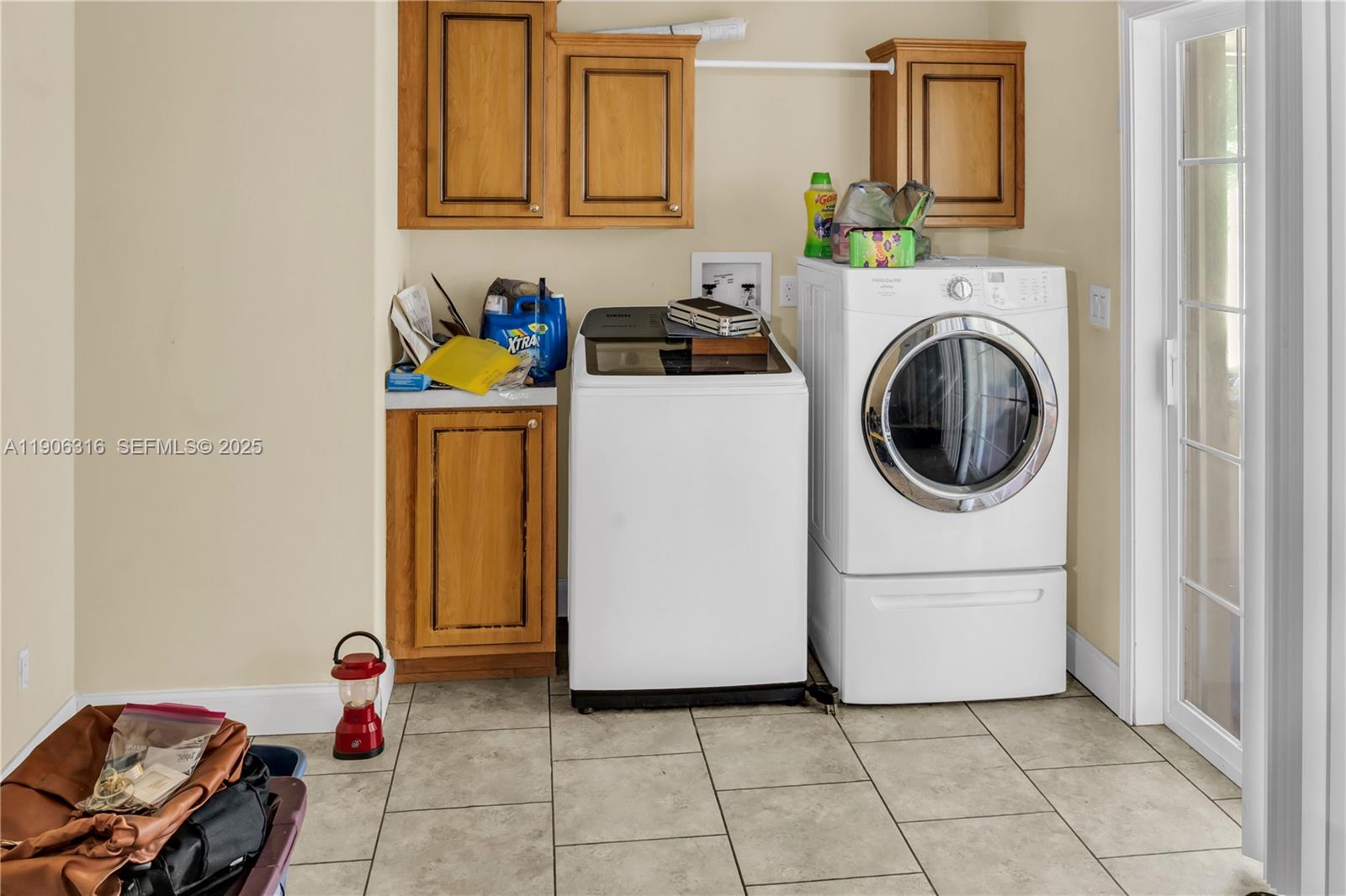 11341 Pruett Road Seffner, FL 33584 - Photo 25 of 50 a utility room with dryer and washer