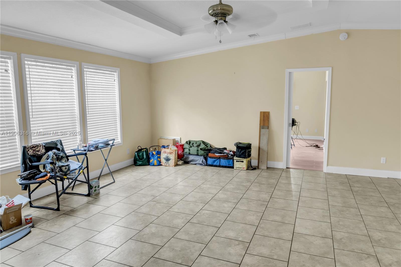 11341 Pruett Road Seffner, FL 33584 - Photo 26 of 50 a view of a room with window and lounge chairs