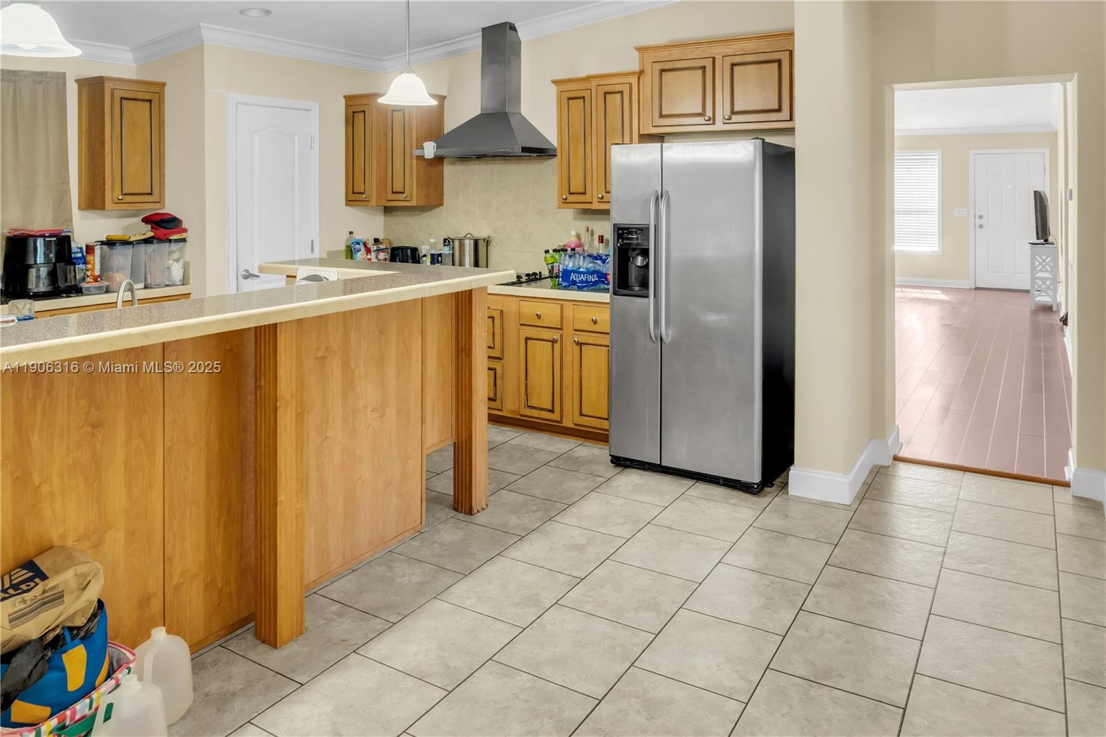 11341 Pruett Road Seffner, FL 33584 - Photo 27 of 50 a kitchen with stainless steel appliances a refrigerator and a sink