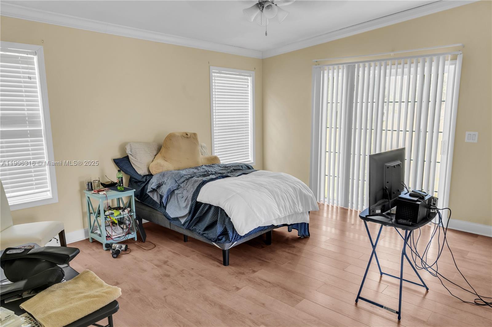 11341 Pruett Road Seffner, FL 33584 - Photo 28 of 50 a bedroom with a bed a chair and a window