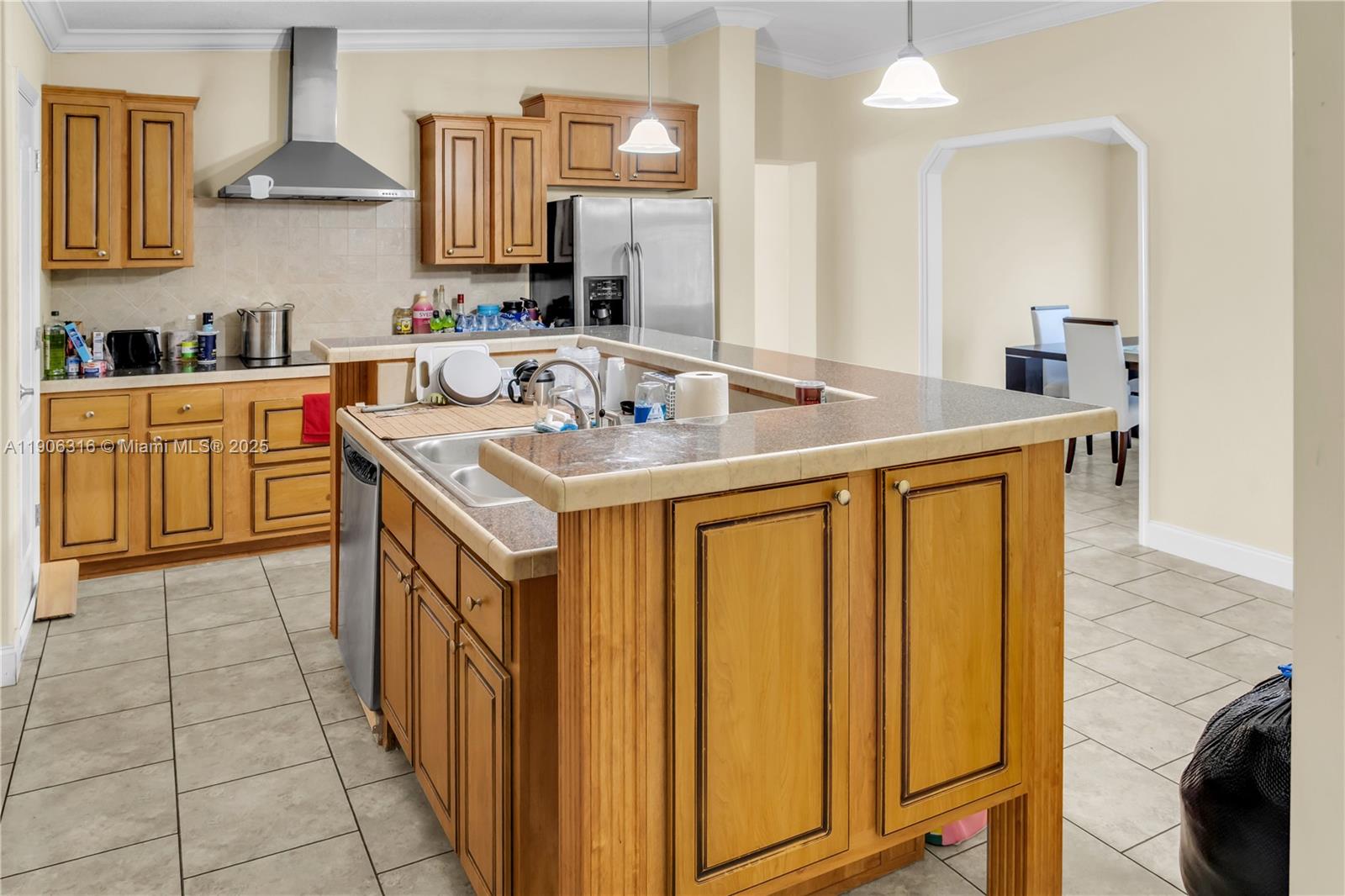 11341 Pruett Road Seffner, FL 33584 - Photo 29 of 50 a kitchen with a sink stove and cabinets