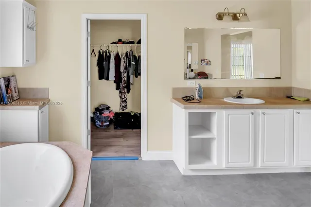 a view of a living room and a sink
