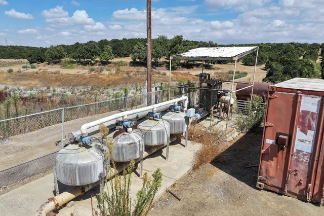 a view of a balcony with chairs