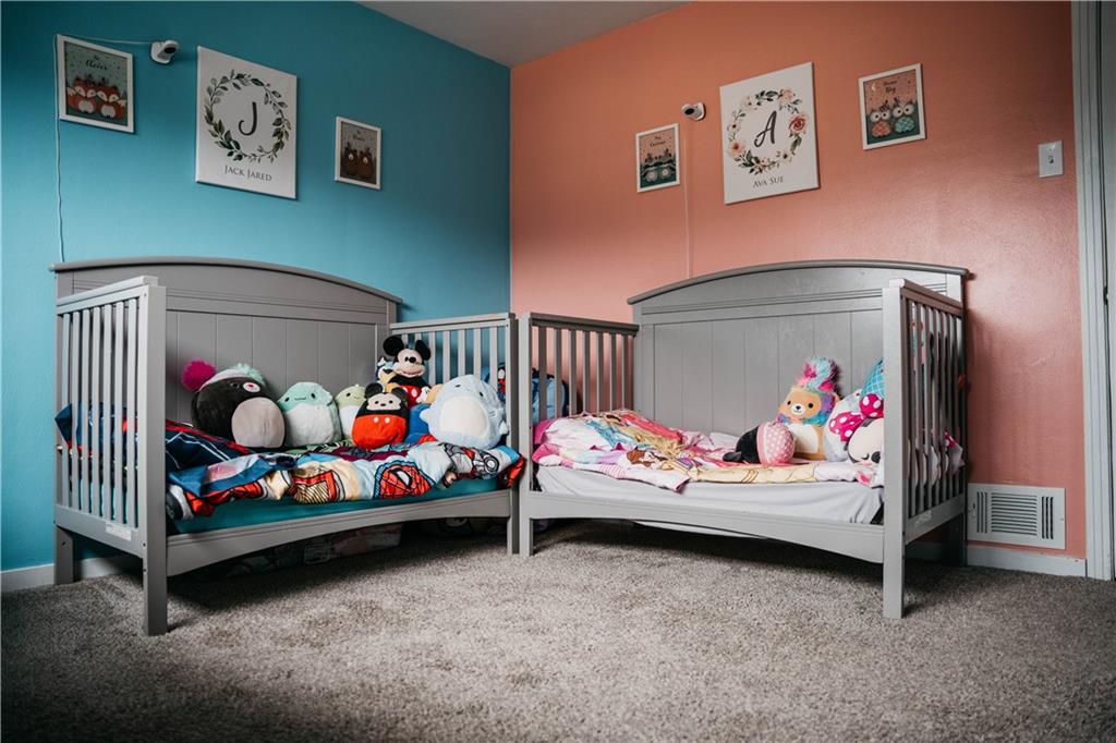 14475 Roberta Drive Irwin, PA 15642 - Photo 11 of 21 a bedroom with a bed and couch