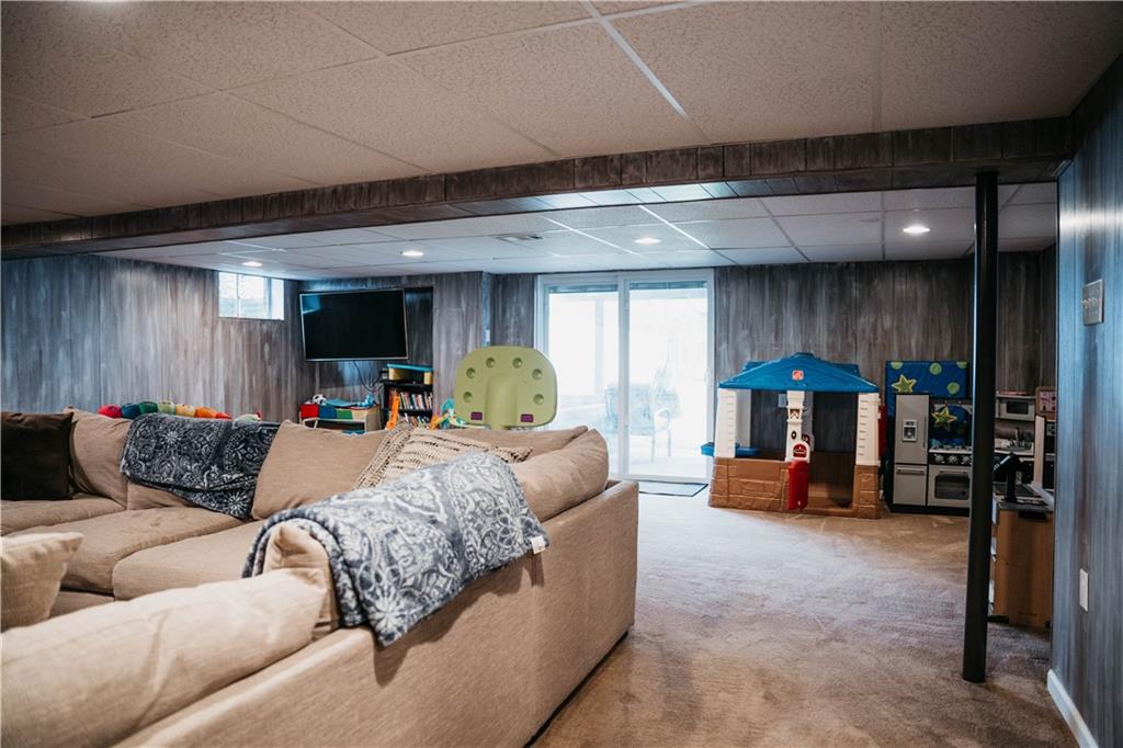 14475 Roberta Drive Irwin, PA 15642 - Photo 15 of 21 a living room with furniture and a large window