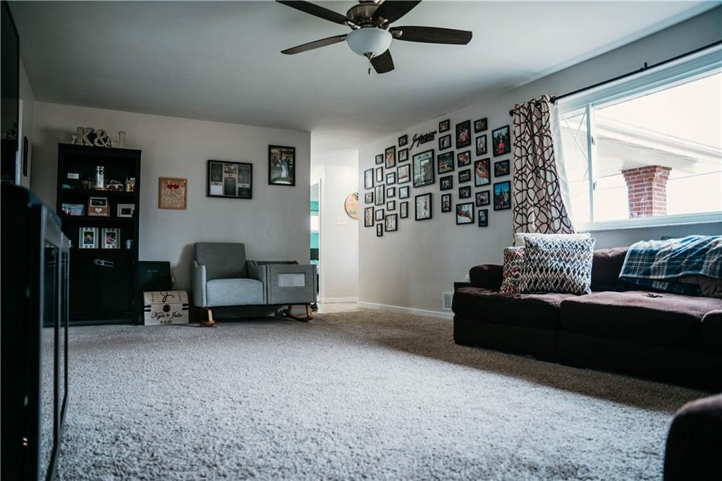 14475 Roberta Drive Irwin, PA 15642 - Photo 3 of 21 a living room with furniture and a window