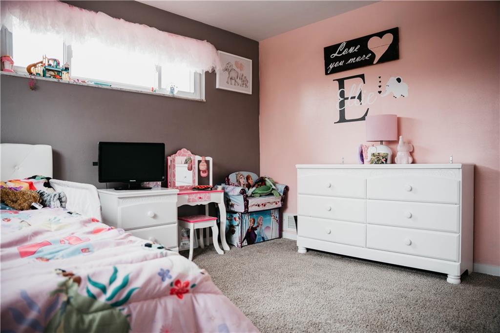 14475 Roberta Drive Irwin, PA 15642 - Photo 9 of 21 a bedroom with a bed and a furniture