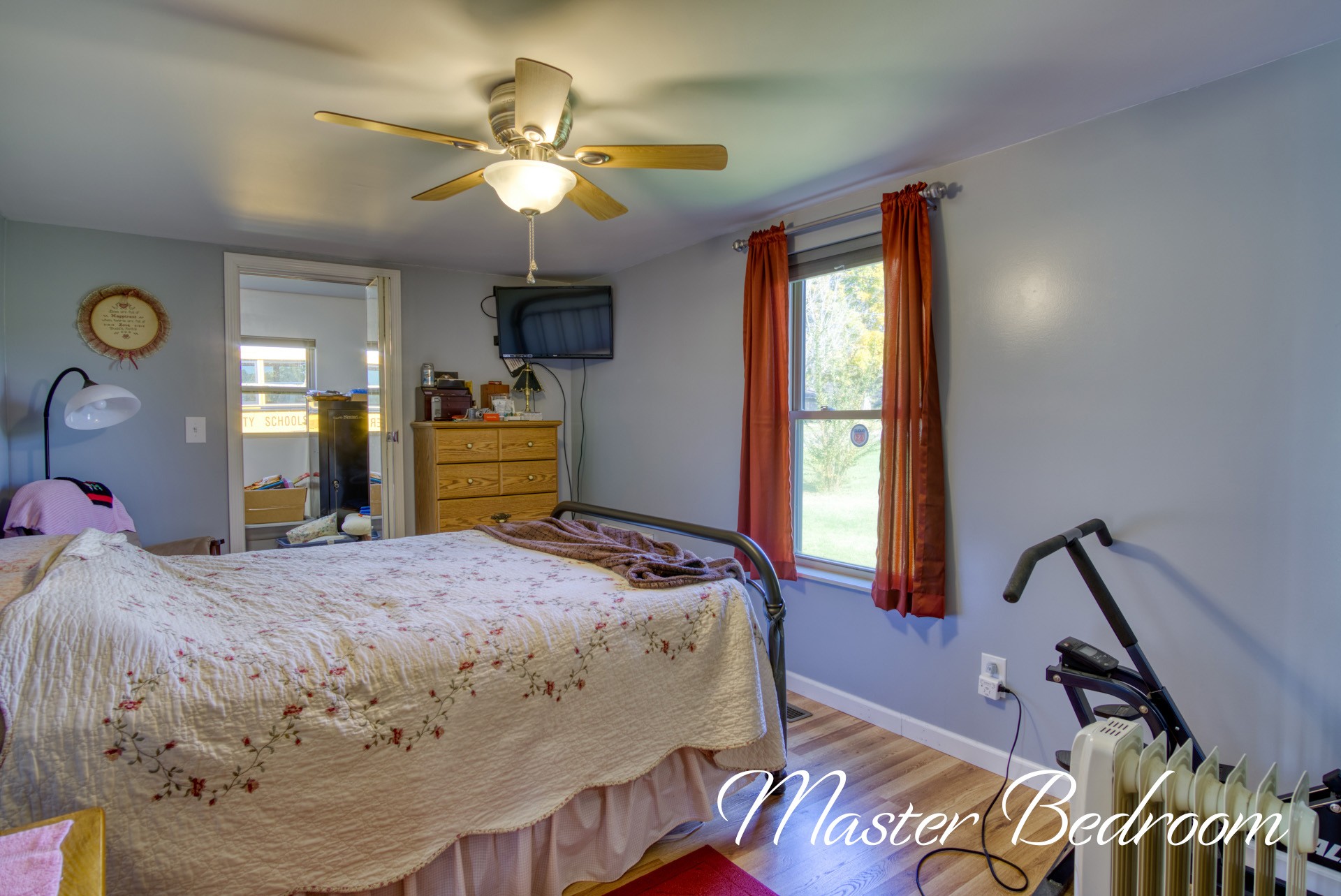 738 Pugh Road Crossville, TN 38555 - Photo 2 of 26 a bedroom with a bed and a chandelier