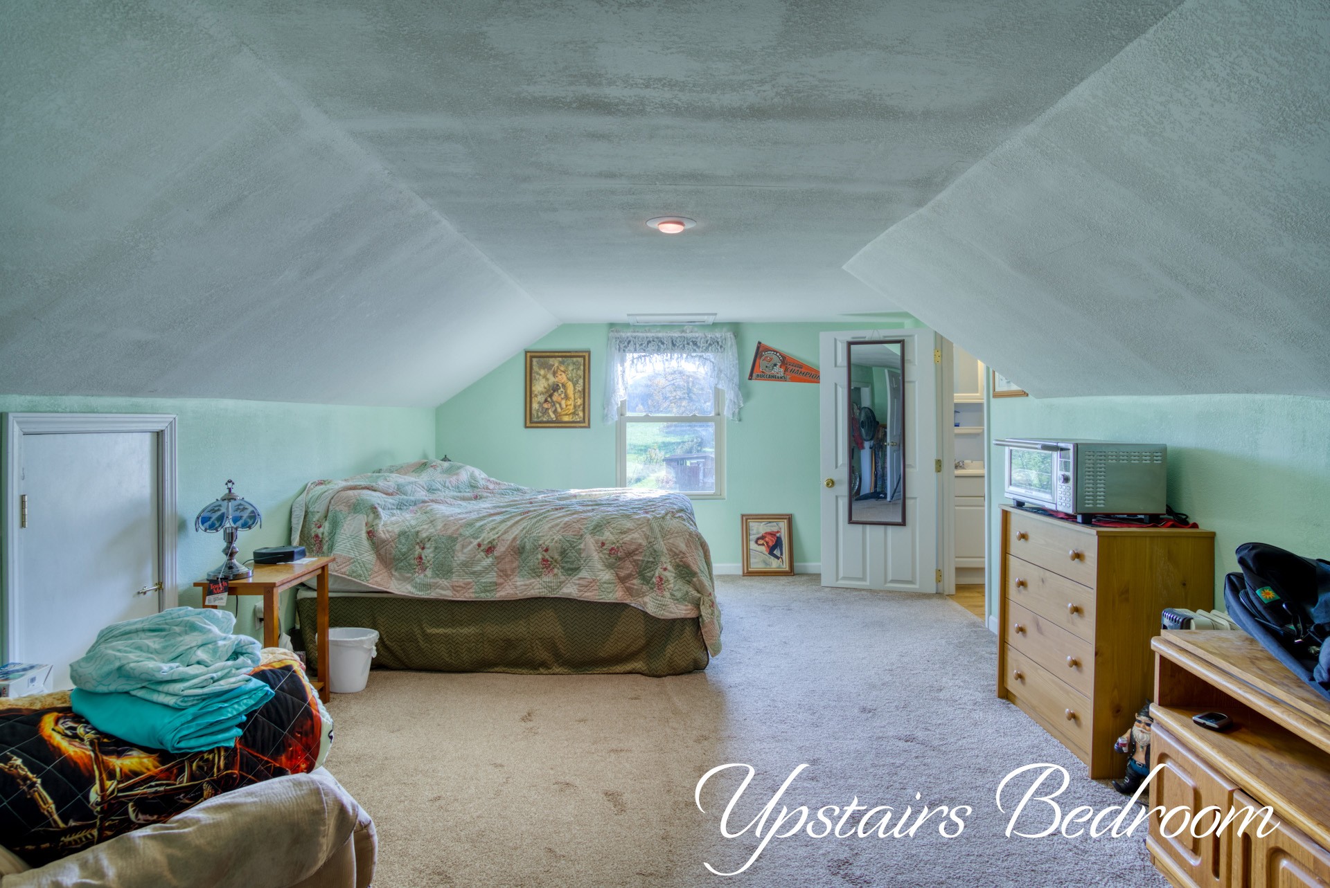 738 Pugh Road Crossville, TN 38555 - Photo 21 of 26 a bedroom with a bed and furniture