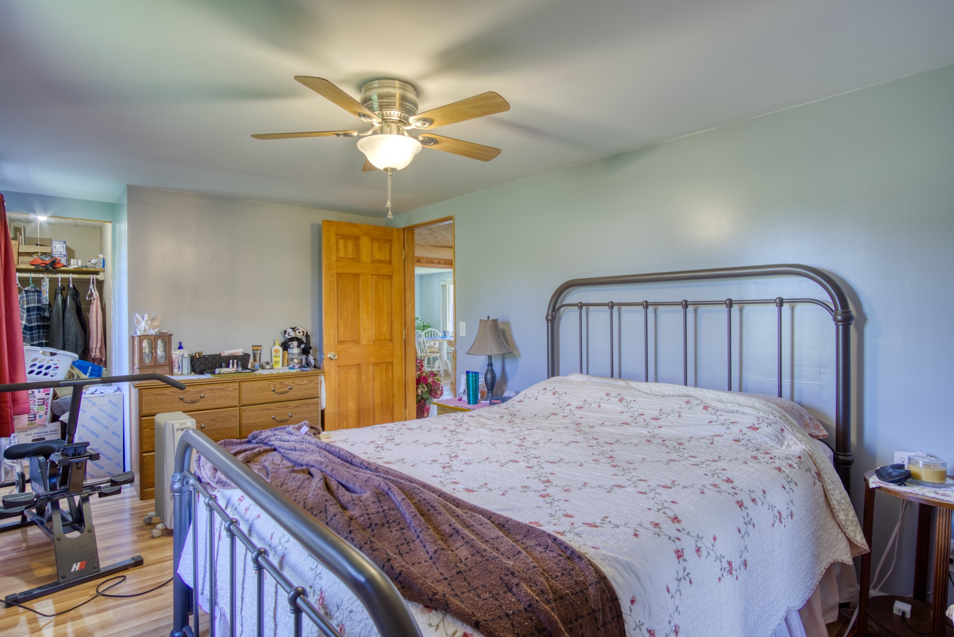 738 Pugh Road Crossville, TN 38555 - Photo 22 of 26 a bed room with a bed and a chandelier
