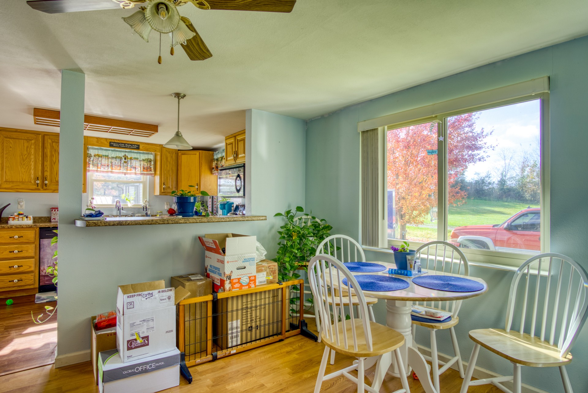 738 Pugh Road Crossville, TN 38555 - Photo 4 of 26 a view of a dining room with furniture a chandelier and wooden floor