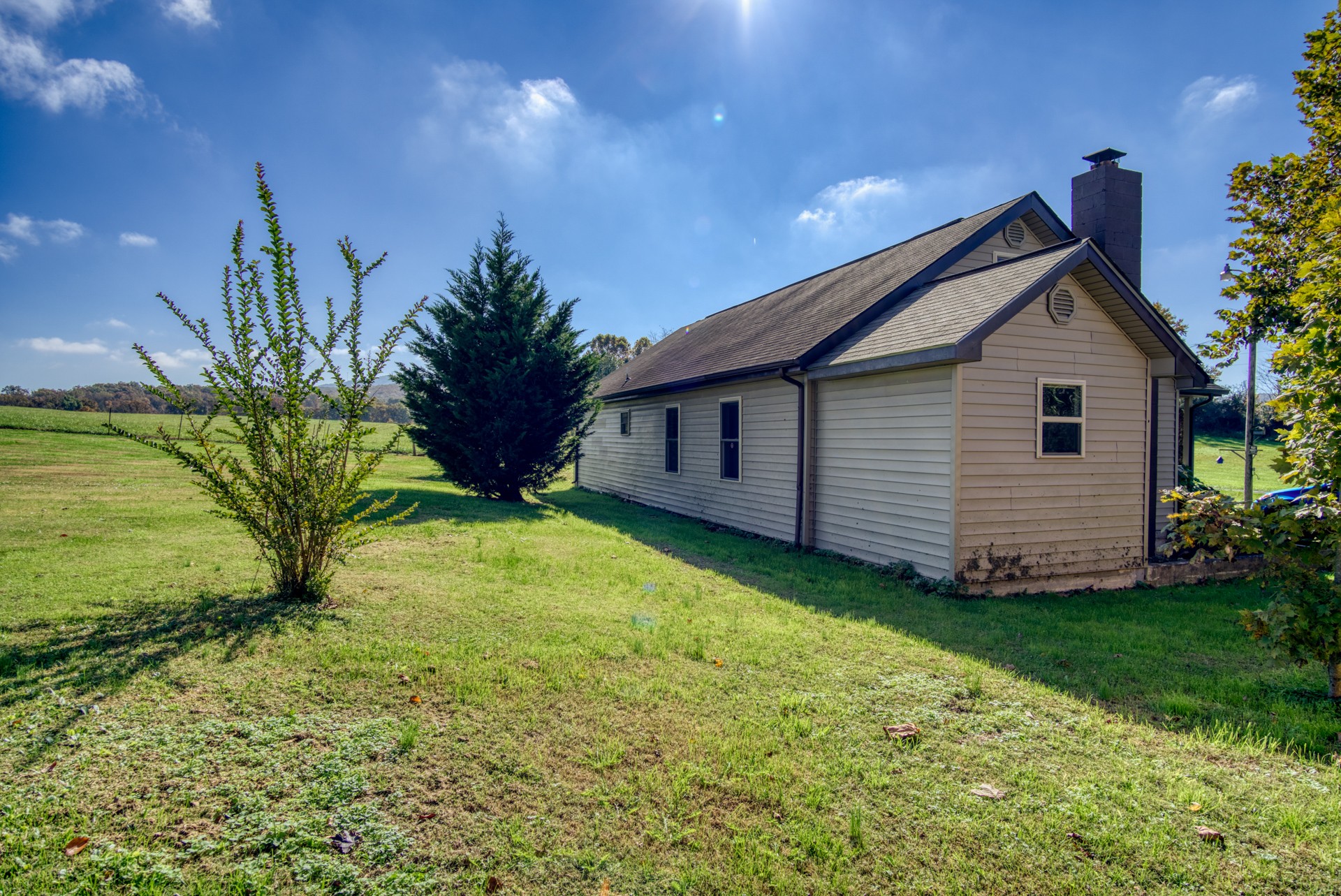 738 Pugh Road Crossville, TN 38555 - Photo 9 of 26 a view of a house with a yard