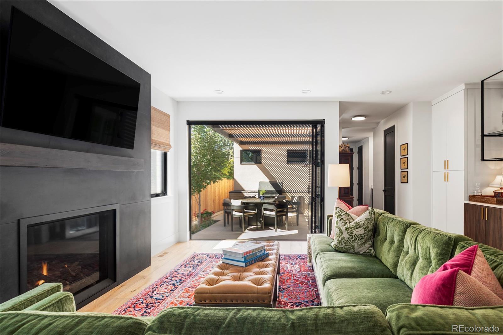 a living room with furniture or outdoor view and a fireplace