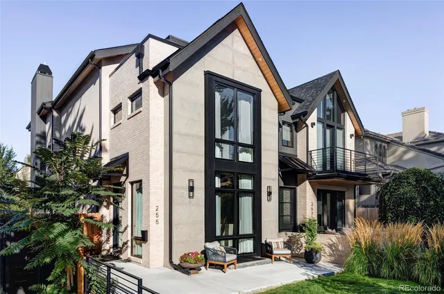 a view of a house with brick walls and windows