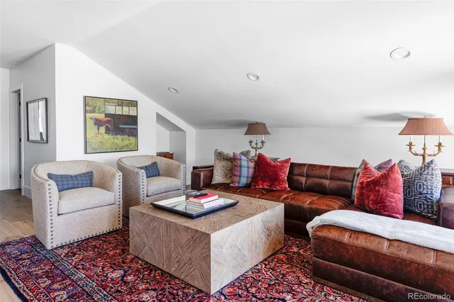 a living room with furniture and a couch