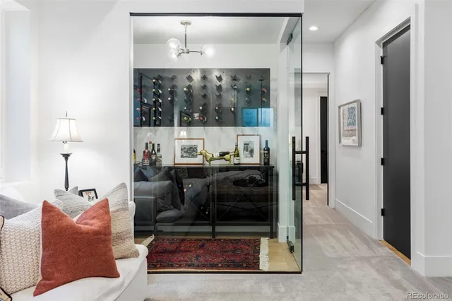 a living room with furniture a window and a table