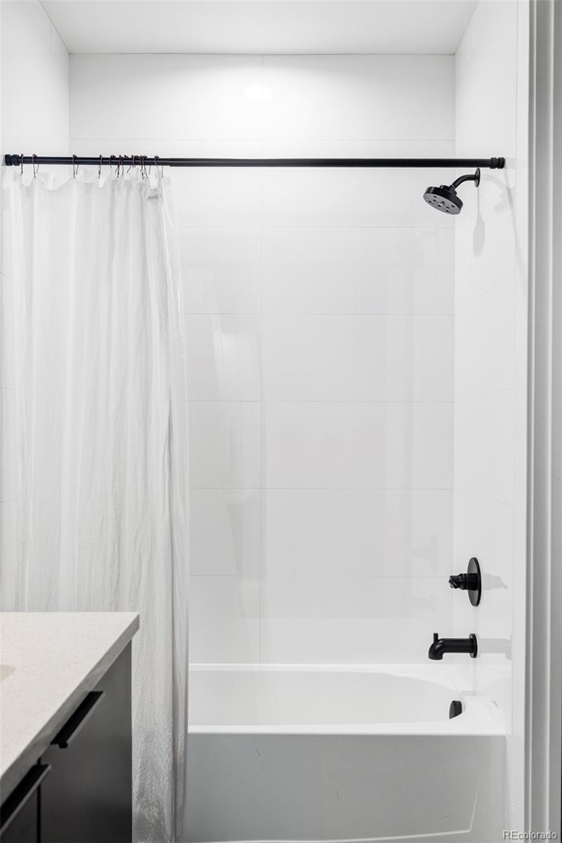 255 Jackson Street Denver, CO 80206 - Photo 32 of 32 a bathroom with a shower