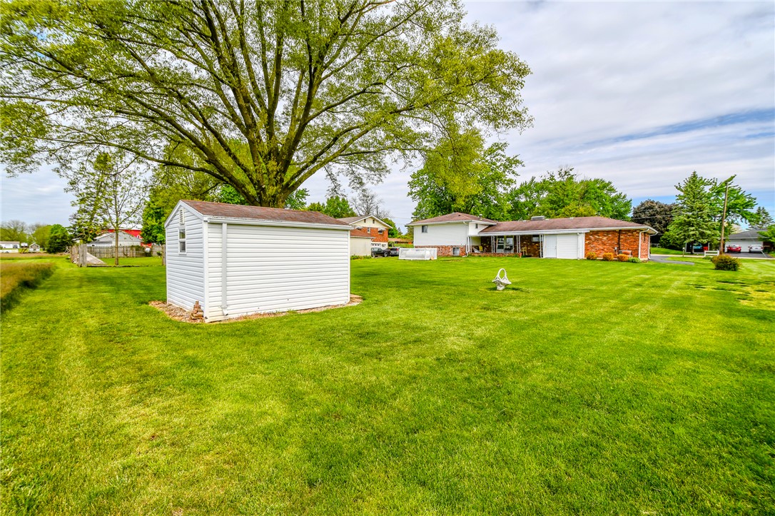 10833 Kendig Road Medway, OH 45341 - Photo 43 of 46 Expansive green space offers a serene backdrop for outdoor activities.