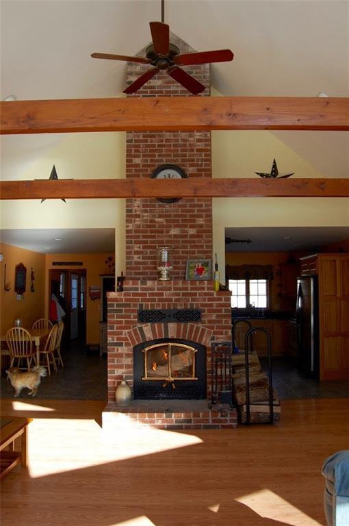 298 Carlton Pond Road Winthrop, ME 04364 - Photo 9 of 35 The wood fireplace is impressive and...