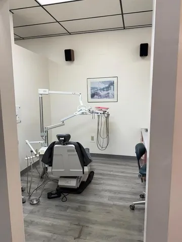 a room with furniture and gym equipment