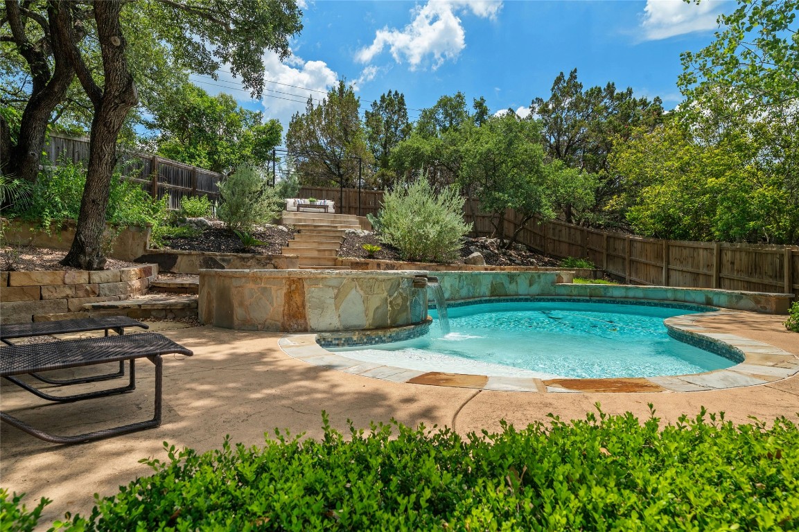 a view of a backyard with green space