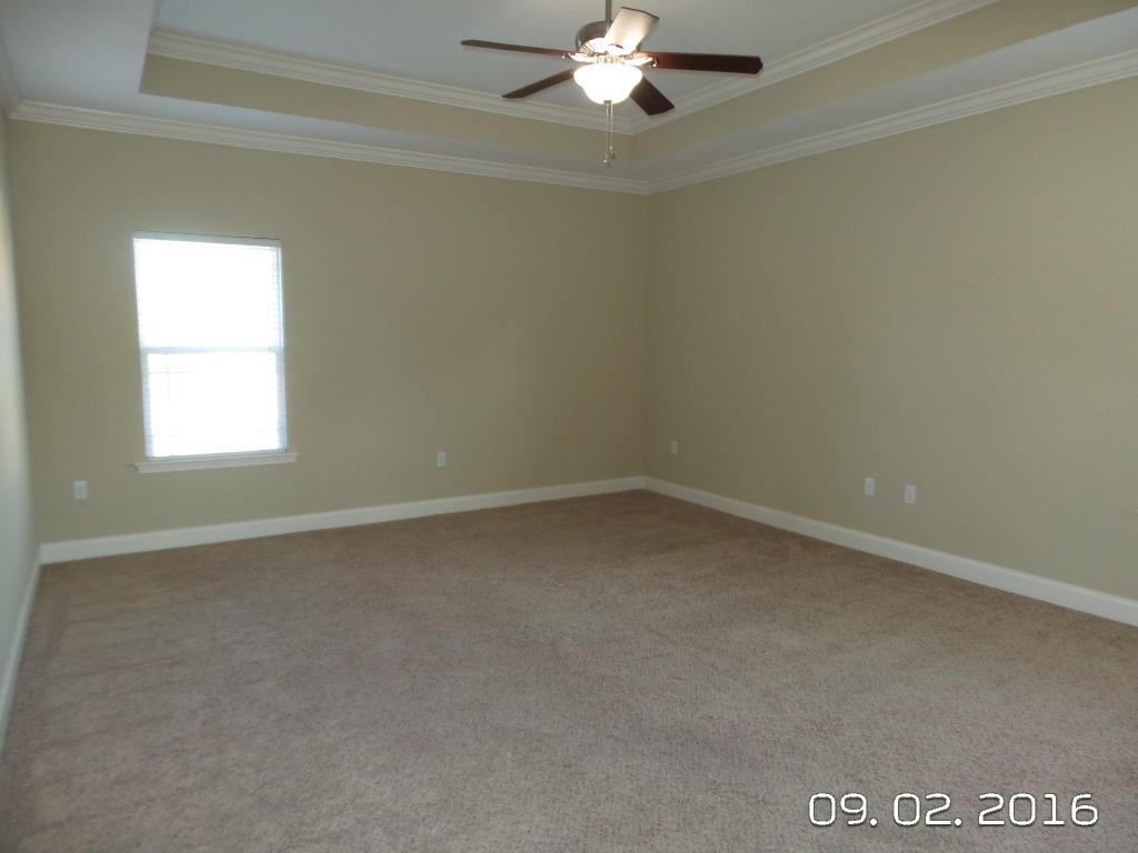 4589 Hermosa Road Crestview, FL 32539 - Photo 12 of 21 an empty room with a window