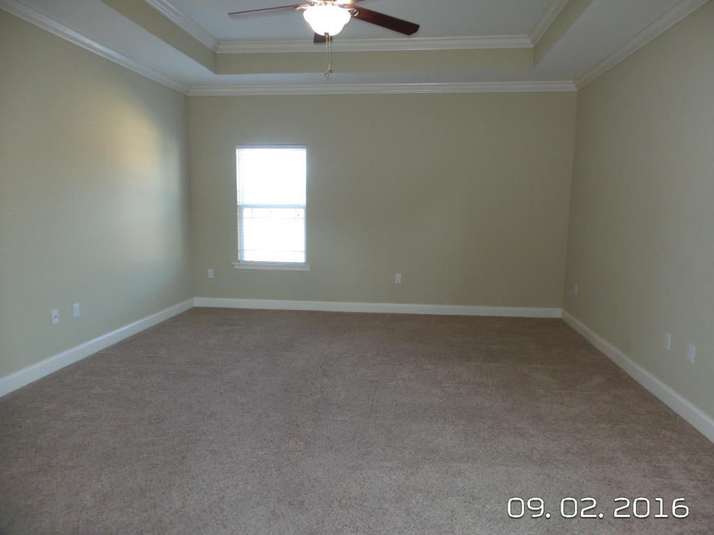 4589 Hermosa Road Crestview, FL 32539 - Photo 13 of 21 an empty room with a window