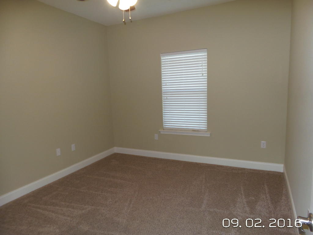 4589 Hermosa Road Crestview, FL 32539 - Photo 20 of 21 an empty room with a window