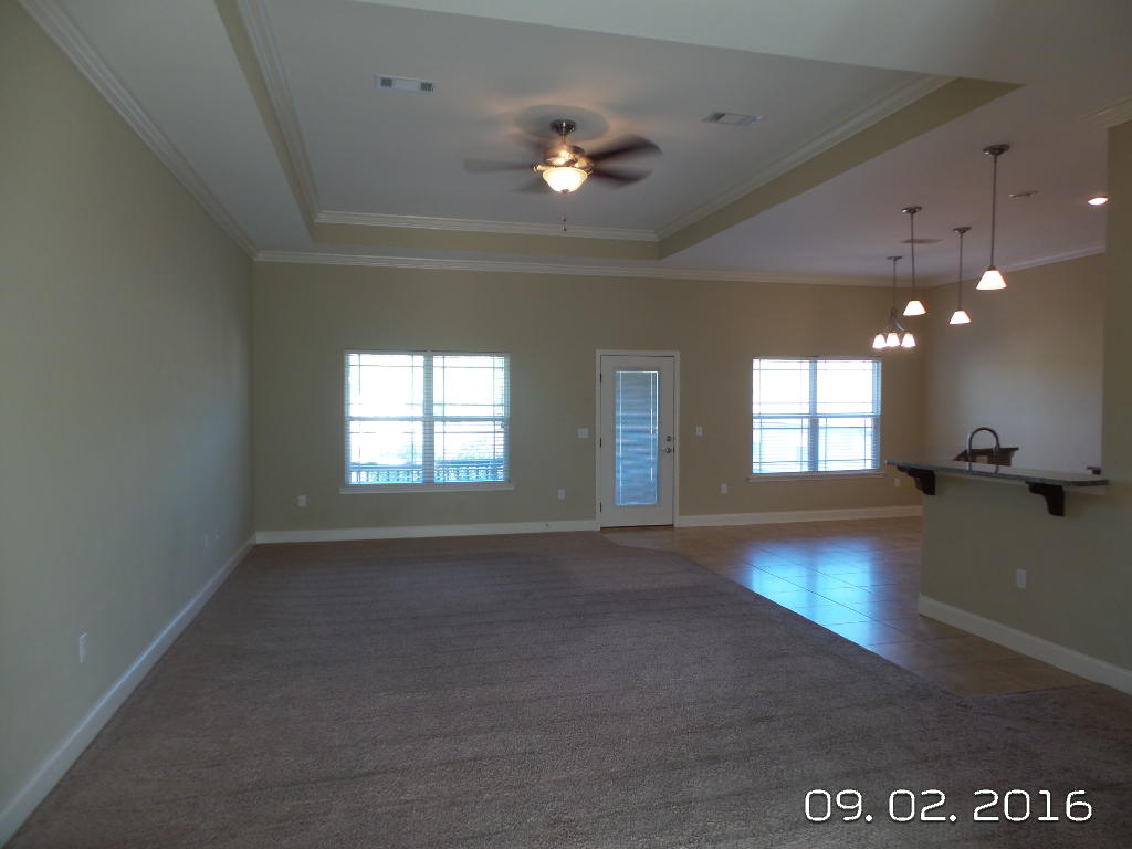 4589 Hermosa Road Crestview, FL 32539 - Photo 3 of 21 a view of an empty room with a window