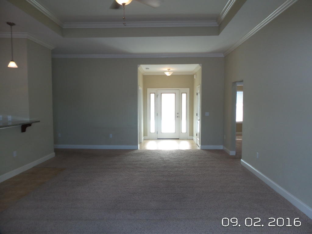 4589 Hermosa Road Crestview, FL 32539 - Photo 4 of 21 a view of an empty room with a window