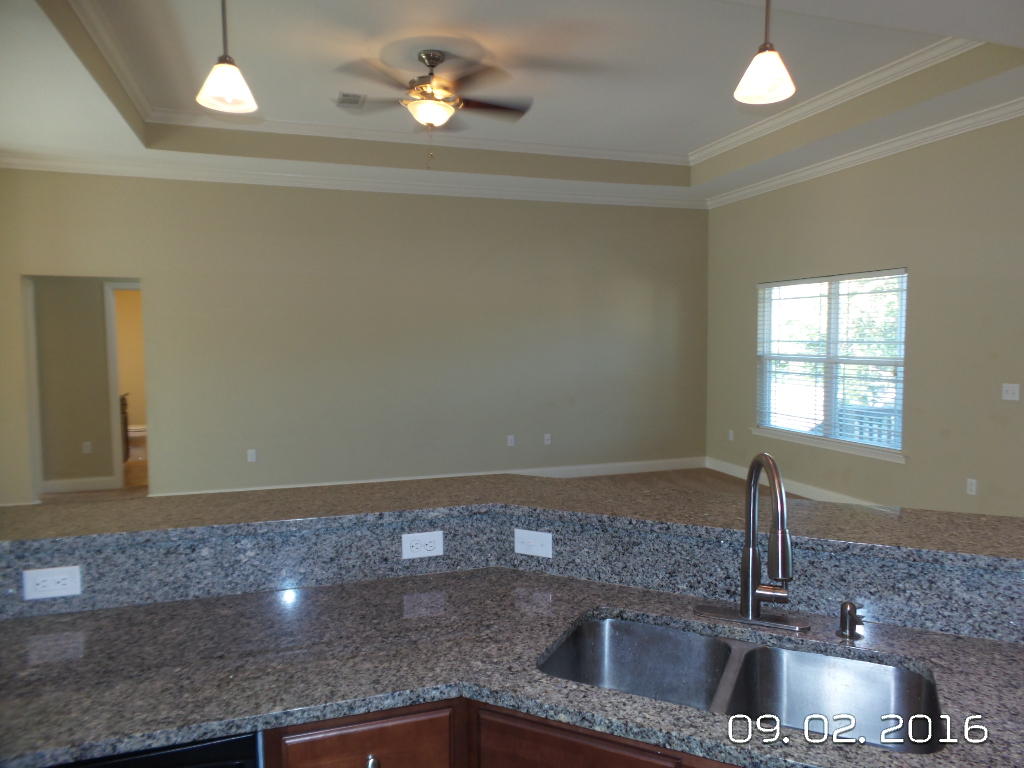 4589 Hermosa Road Crestview, FL 32539 - Photo 10 of 21 a kitchen with a sink and a window
