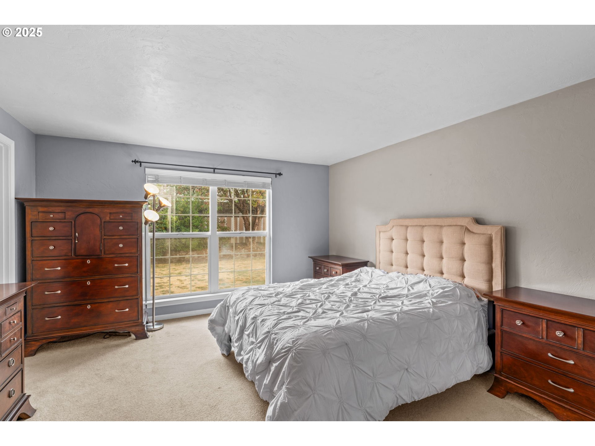 2180 Southeast Madison Street Albany, OR 97322 - Photo 16 of 28 a bedroom with a bed and a dresser