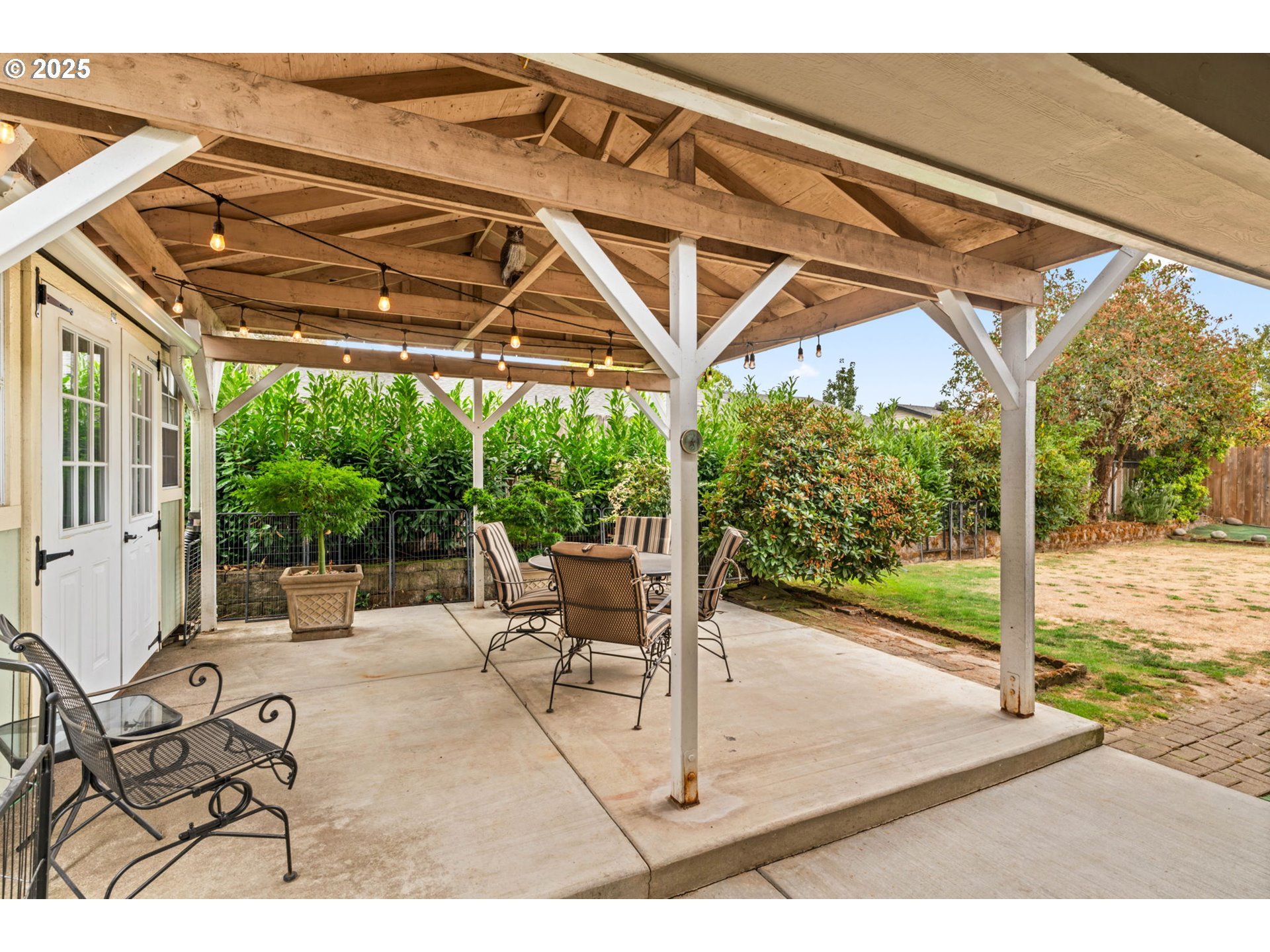2180 Southeast Madison Street Albany, OR 97322 - Photo 25 of 28 a patio with yard glass top table and chairs