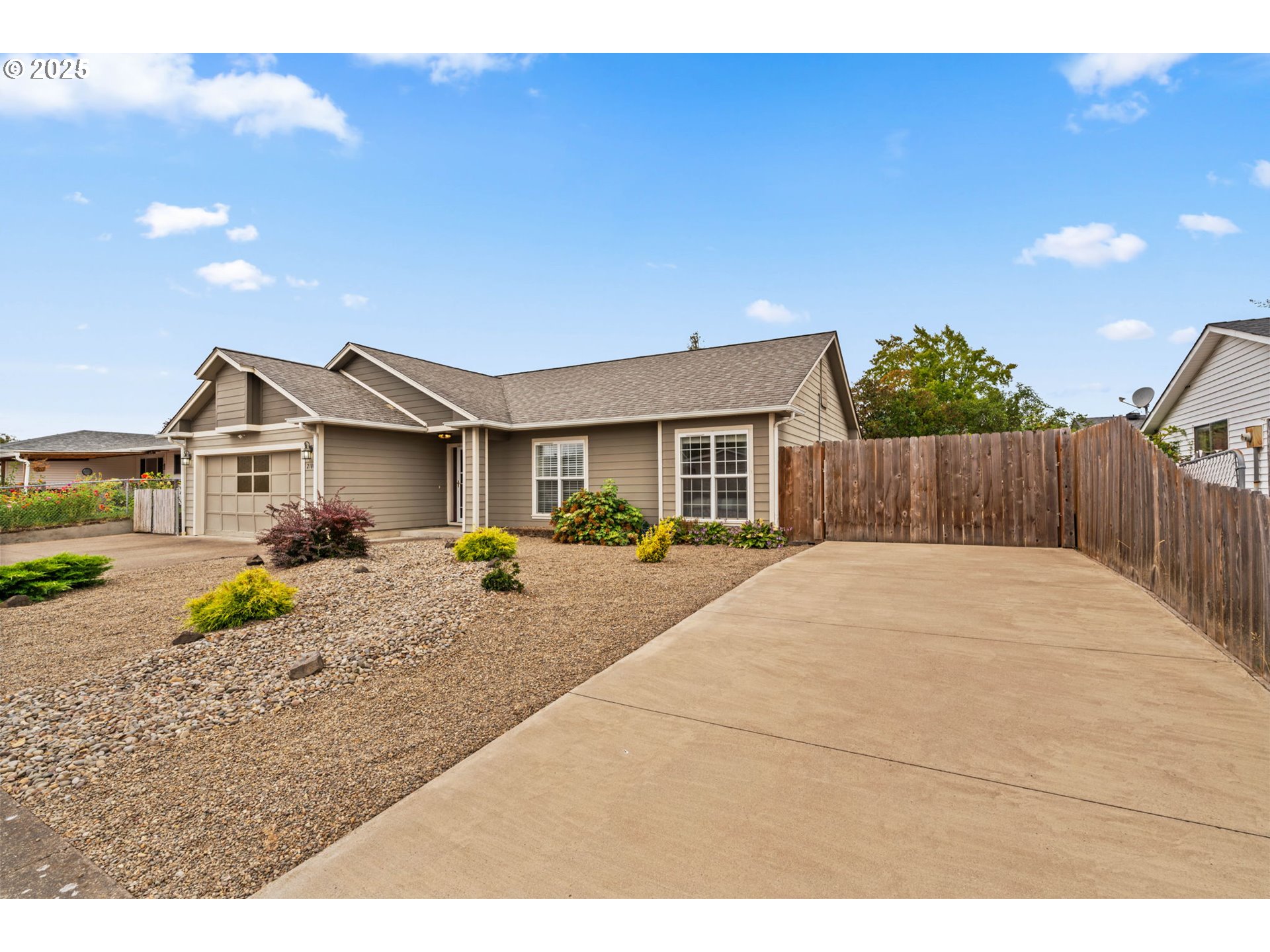 2180 Southeast Madison Street Albany, OR 97322 - Photo 4 of 28 a aerial view of a house with table and chairs