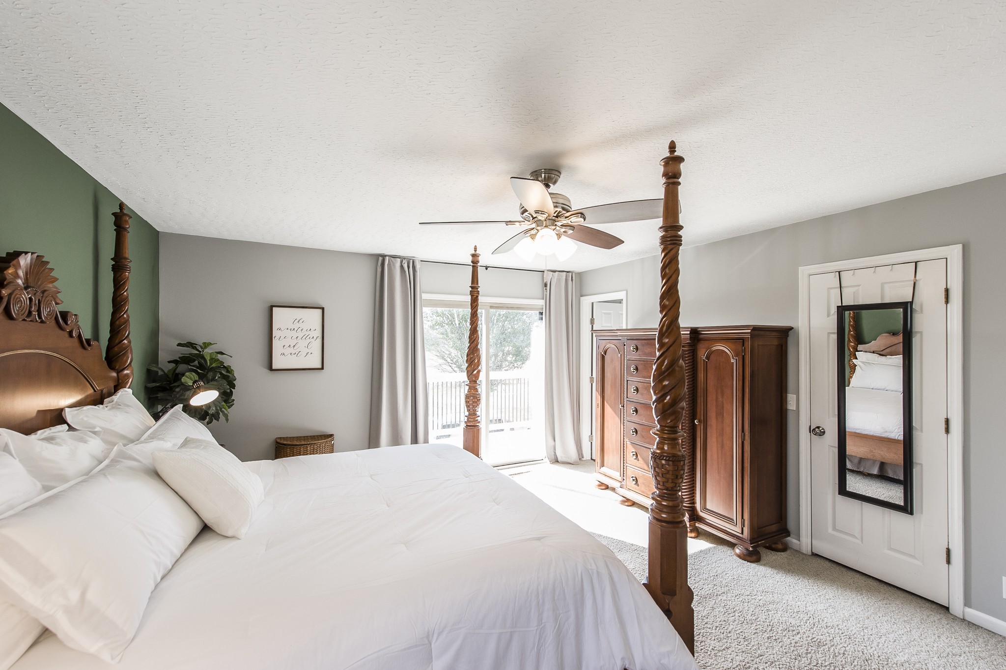 500 Burford Road Lebanon, TN 37087 - Photo 18 of 50 a bedroom with a large bed and a chandelier
