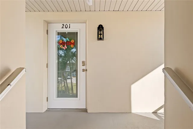a view of a hallway with closet