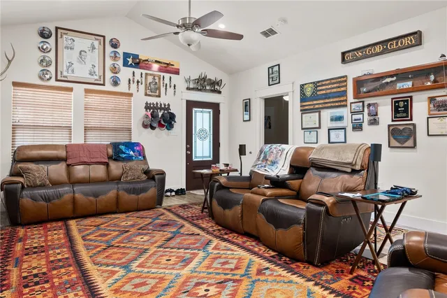a living room with furniture and a couch