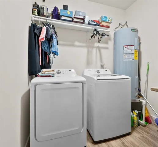 a utility room with dryer and washer